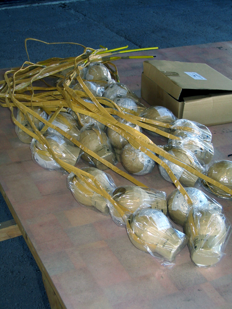 Professional spherical fireworks shells on a preparation table